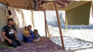 Syrian refugees in their makeshift tent in Erbil. Source: REVERS (2016).